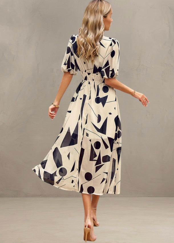 ASTELLA | FLATTERING FLORAL MIDI DRESS